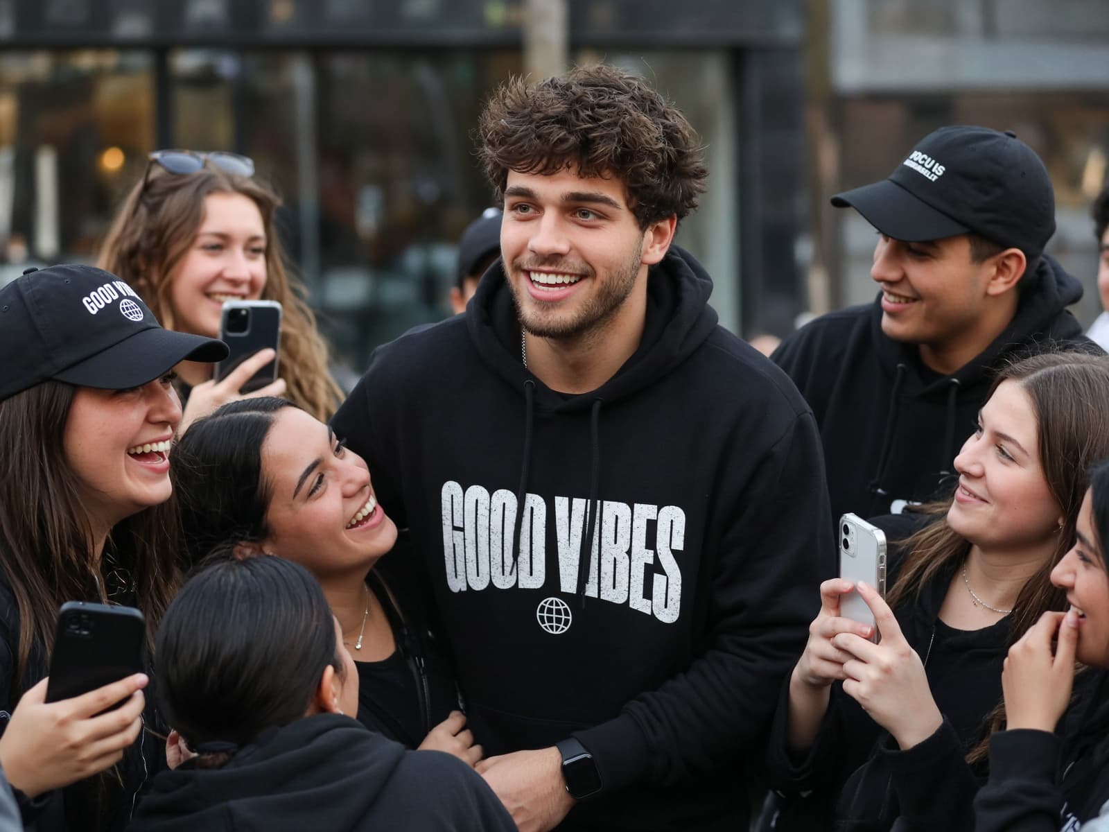 A creator celebrating with their community